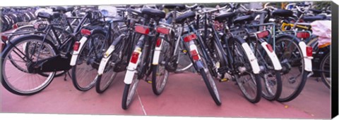 Framed Bicycles parked in a parking lot, Amsterdam, Netherlands Print