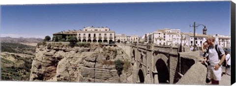 Framed Tourists standing on a bridge, Puente Nuevo, Ronda, Malaga Province, Andalusia, Spain Print