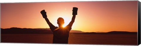 Framed Silhouette of a person wearing boxing gloves in a desert at dusk, Black Rock Desert, Nevada, USA Print