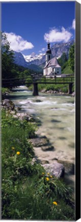 Framed Bridge over stream below country church, Bavarian Alps, Germany. Print