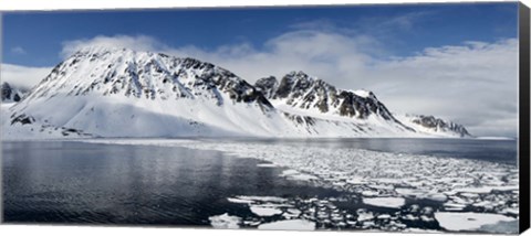 Framed Ice floes on water with a mountain range in the background, Magdalene Fjord, Spitsbergen, Svalbard Islands, Norway Print