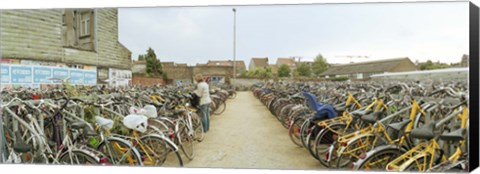 Framed Bicycles parked in the parking lot of a railway station, Gent-Sint-Pieters, Ghent, East Flanders, Flemish Region, Belgium Print