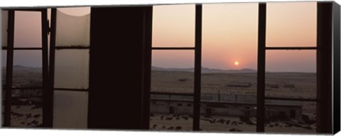 Framed Sunrise viewed through a window, Sperrgebiet, Kolmanskop, Namib Desert, Namibia Print