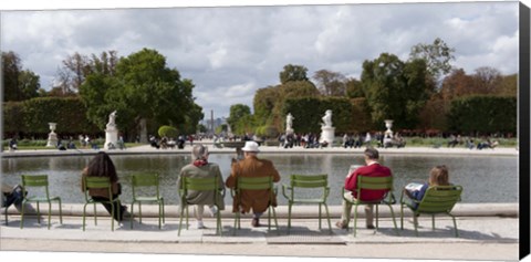 Framed Tourists sitting in chairs, Jardin de Tuileries, Paris, Ile-de-France, France Print
