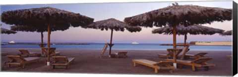 Framed Lounge chairs with sunshades on the beach, Hilton Resort, Hurghada, Egypt Print