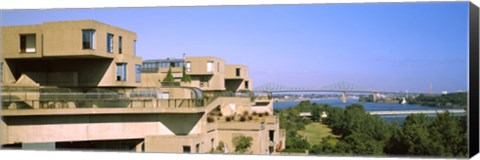 Framed Housing complex with a bridge in the background, Habitat 67, Jacques Cartier Bridge, Montreal, Quebec, Canada Print