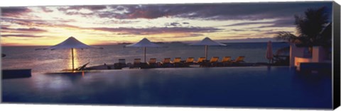 Framed Lounge chairs and patio umbrellas at a tourist resort, Matamanoa Island Resort, Mamanuca Islands, Fiji Print