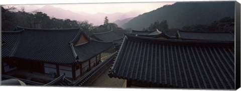 Framed Buddhist temple with mountain range in the background, Kayasan Mountains, Haeinsa Temple, Gyeongsang Province, South Korea Print