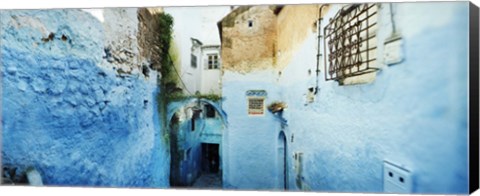 Framed Narrow streets of the medina are all painted blue, Chefchaouen, Morocco Print