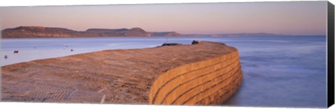 Framed Harbour wall at dusk, The Cobb, Lyme Regis, Dorset, England Print