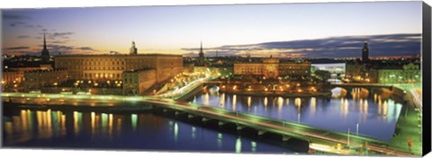 Framed Royal Palace and Parliament building lit up at dusk, Stockholm, Sweden Print