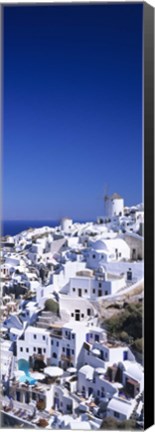 Framed Aerial view of houses in a town, Oia, Santorini, Cyclades Islands, Greece Print