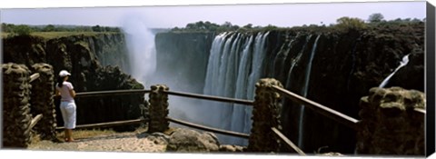 Framed Woman looking at the Victoria Falls from a viewing point, Zambia Print