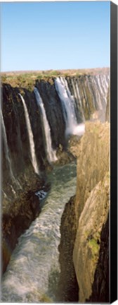 Framed Water falling through rocks in a river, Victoria Falls, Zimbabwe Print