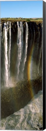 Framed Rainbow forms in the water spray in the gorge at Victoria Falls, Zimbabwe Print