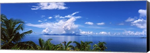 Framed Indian ocean with palm trees towards Mahe Island looking from North Island, Seychelles Print