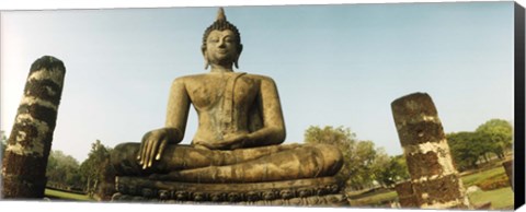 Framed Low angle view of a statue of Buddha, Sukhothai Historical Park, Sukhothai, Thailand Print