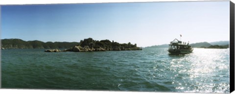 Framed Rocky island and boat in the Mediterranean sea, Sunken City, Kekova, Antalya Province, Turkey Print