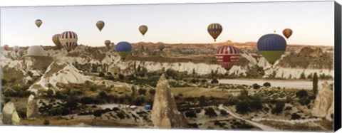 Framed Mulit colored hot air balloons at sunrise over Cappadocia, Central Anatolia Region, Turkey Print