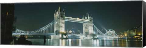 Framed Low angle view of a bridge lit up at night, Tower Bridge, London, England Print