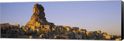 Framed Low angle view of a rock formation in a village, Cappadocia, Turkey Print