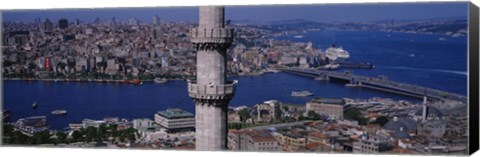 Framed Mid section view of a minaret with bridge across the bosphorus in the background, Istanbul, Turkey Print