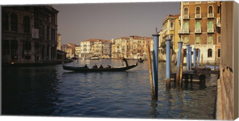 Framed Tourists sitting in a gondola, Grand Canal, Venice, Italy Print