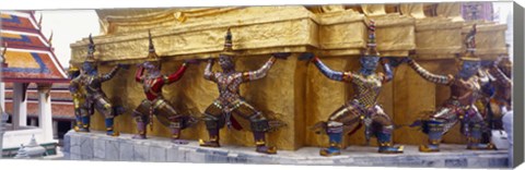 Framed Statues at base of golden chedi, The Grand Palace, Bangkok, Thailand Print