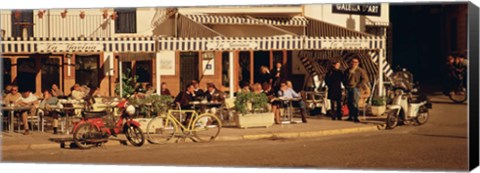 Framed Tourists sitting in a cafe, Sitges Beach, Catalonia, Spain Print