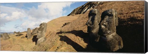 Framed Low angle view of Moai statues, Tahai Archaeological Site, Rano Raraku, Easter Island, Chile Print