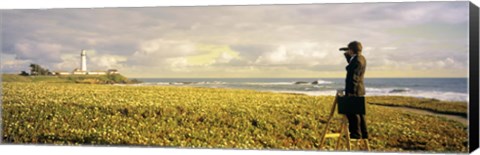 Framed USA, California, Businessman standing holding binoculars and looking at the lighthouse Print