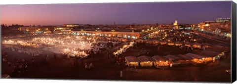 Framed High angle view of a market lit up at dusk, Djemaa El Fna, Medina Quarter, Marrakesh, Morocco Print