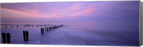 Framed Wooden Posts In Water, Sandsend, Yorkshire, England, United Kingdom Print