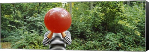 Framed Woman blowing a balloon, Germany Print