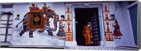 Framed Young woman standing at the door, Udaipur, Rajasthan, India Print