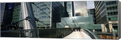 Framed Bridge in front of buildings, Canary Wharf, London, England Print