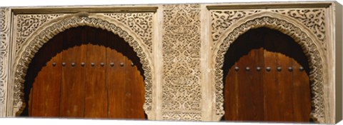 Framed Low angle view of carving on arches of a palace, Court Of Lions, Alhambra, Granada, Andalusia, Spain Print