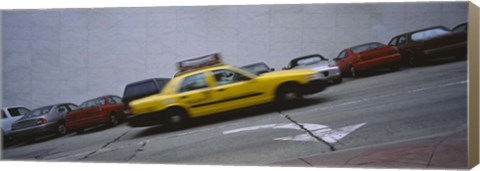 Framed Taxi running on the road, San Francisco, California, USA Print