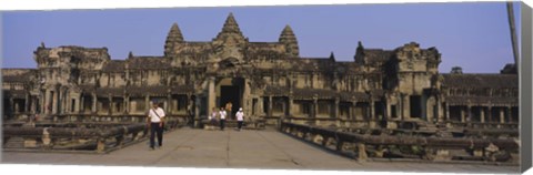 Framed Tourists walking in front of an old temple, Angkor Wat, Siem Reap, Cambodia Print