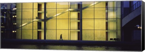 Framed Silhouette of a person walking in front of a building, Paul Lobe Haus, Berlin, Germany Print
