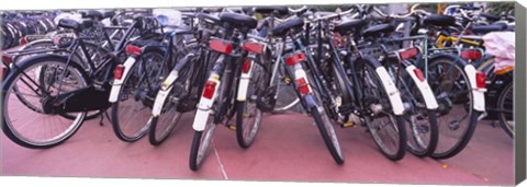 Framed Bicycles parked in a parking lot, Amsterdam, Netherlands Print