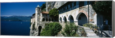 Framed Walkway along a building at a lake, Santa Caterina del Sasso, Lake Maggiore, Piedmont, Italy Print