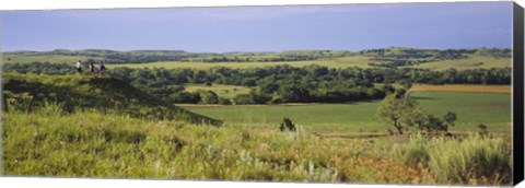 Framed Three mountain bikers on a hill, Kansas, USA Print