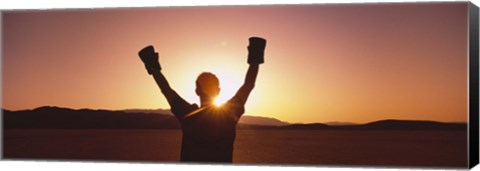 Framed Silhouette of a person wearing boxing gloves in a desert at dusk, Black Rock Desert, Nevada, USA Print