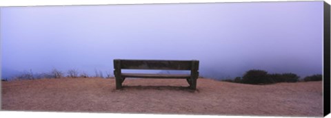 Framed Empty bench in a parking lot, California, USA Print