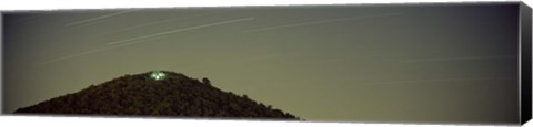 Framed Low angle view of star trails over a mountain peak, Echo Mountain, Piediluco Lake, Terni, Umbria, Italy Print