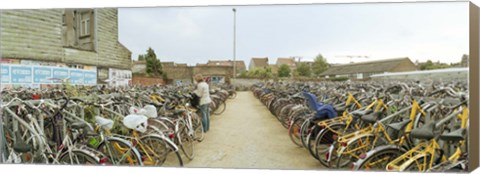 Framed Bicycles parked in the parking lot of a railway station, Gent-Sint-Pieters, Ghent, East Flanders, Flemish Region, Belgium Print