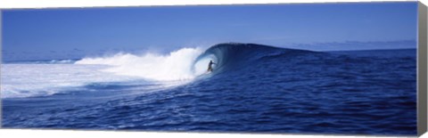 Framed Surfer in the sea, Tahiti, French Polynesia Print