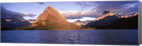 Framed Sunlight falling on mountains at the lakeside, Swiftcurrent Lake, Many Glacier, US Glacier National Park, Montana, USA Print