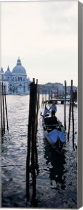 Framed Gondolier in a gondola with a cathedral in the background, Santa Maria Della Salute, Venice, Veneto, Italy Print